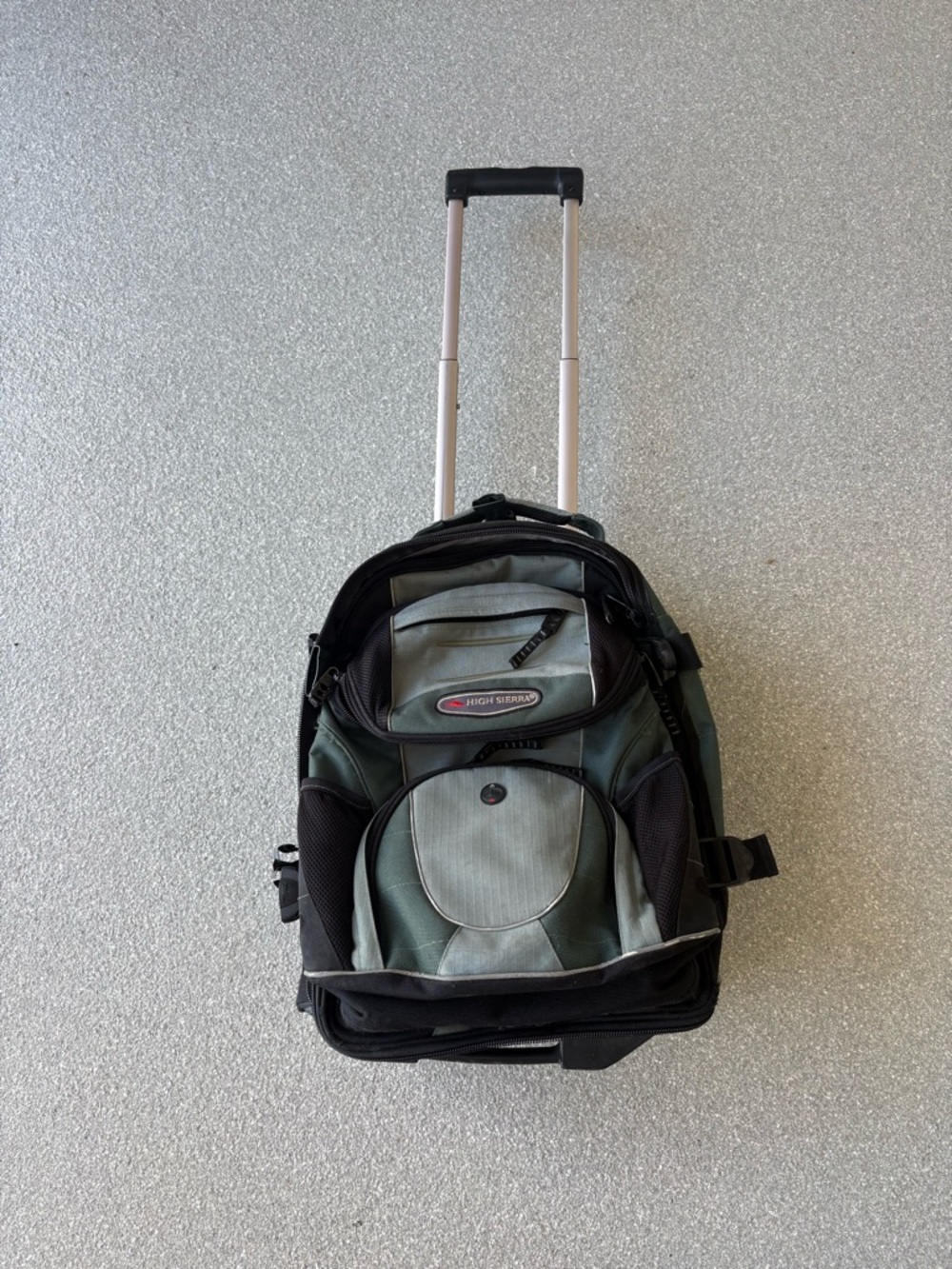 High Sierra Green Rolling Backpack/converts into carry on and regular backpack